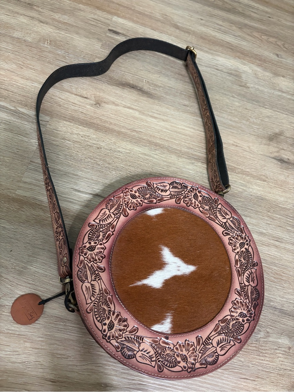Myra Bag Round Tooled Leather Crossbody in Brown and White - Picture 1 of 6